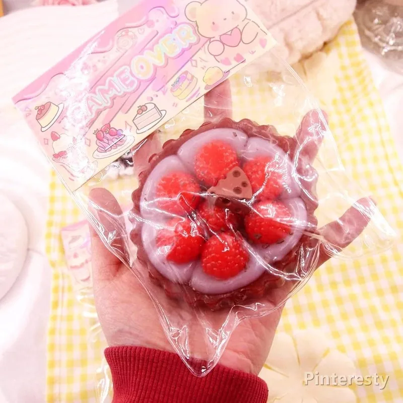 اسکوییشی نرمالو خامهای کیک صورتی | Pink Cream Cake Squishy - تصویر اصلی محصول در فروشگاه پینترستی
